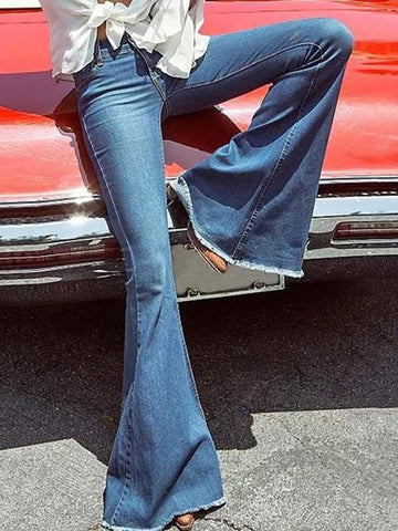 Flared Jeans with Distressed Hemline