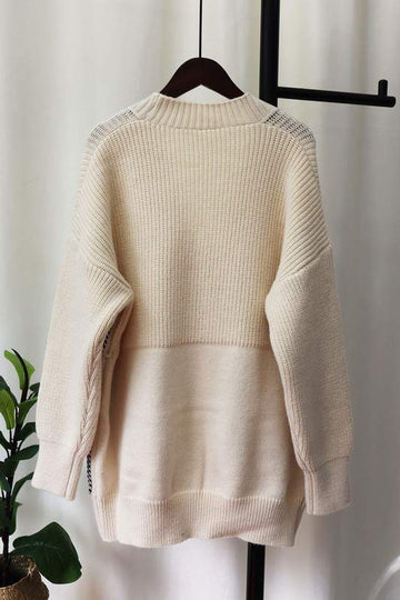 KNITTED BUTTON SWEATER