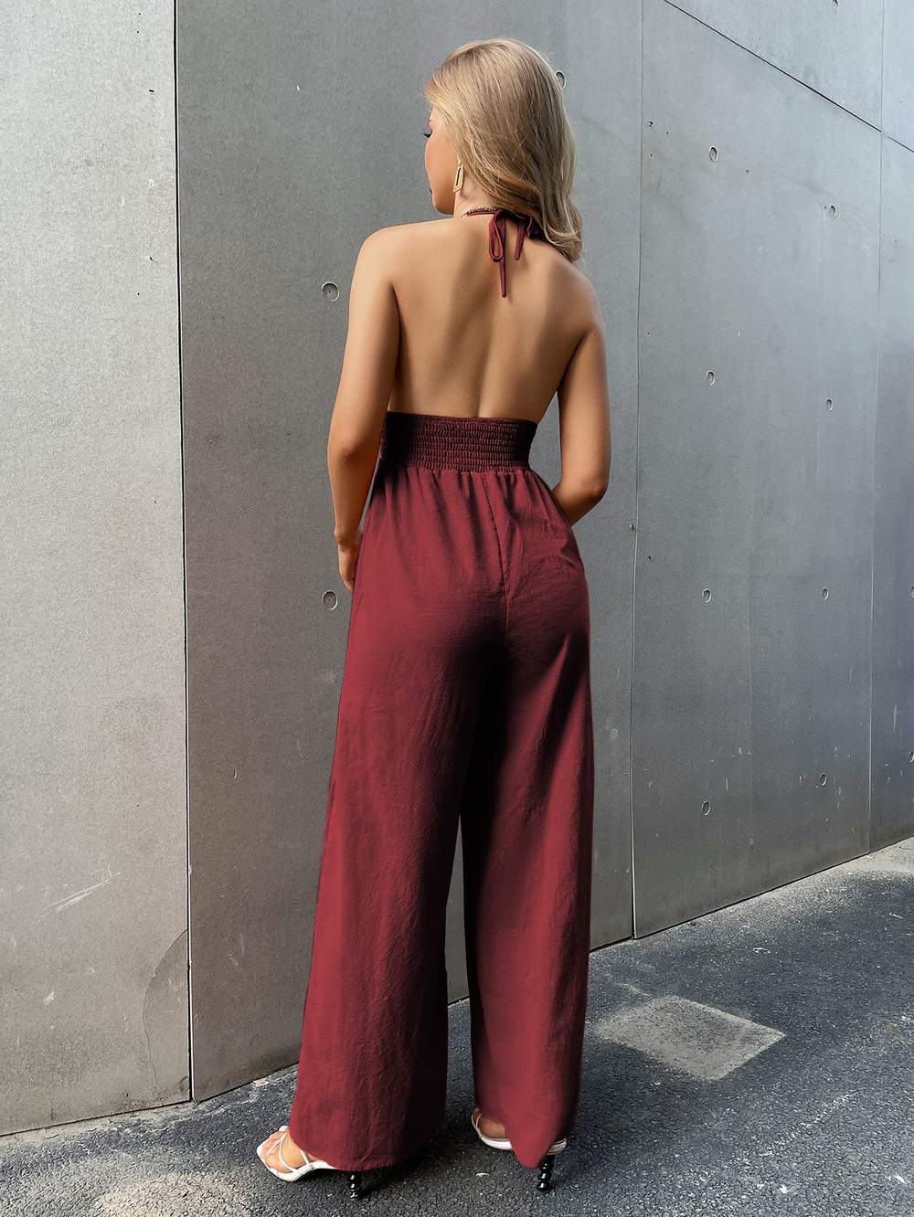 SHIRRED WAIST WIDE LEG HALTER JUMPSUIT