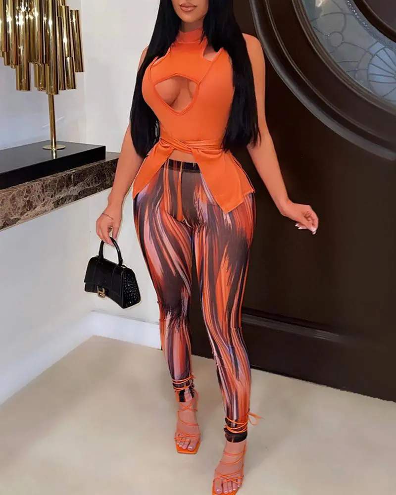 CUTOUT ASYMMETRICAL TOP ALLOVER PRINT PANTS SET