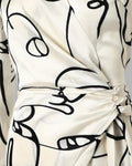 ABSTRACT FIGURE PRINT LONG SLEEVE WRAP DRESS - Missyess