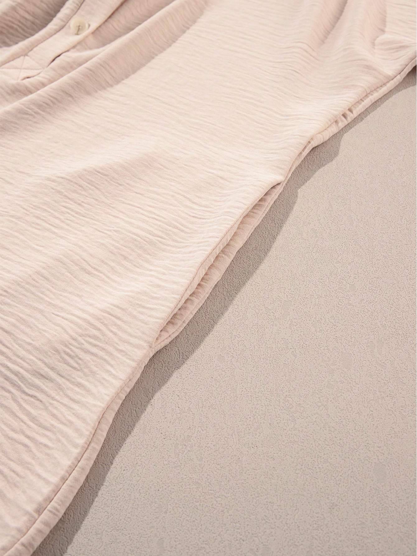 ASTYLISH WOMEN S PLAIN HALF SLEEVE BUTTON COLLARED LOOSE OVERSIZED SHORTS ROMPER WITH POCKET - Missyess