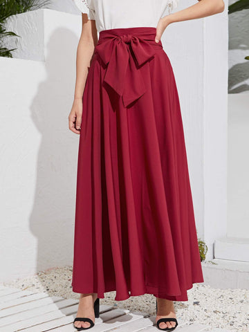 HIGH WAIST ZIP BACK KNOT SWING SKIRT