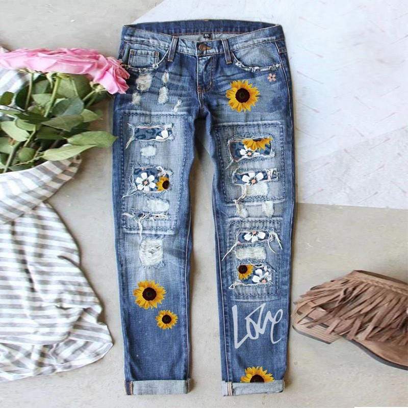 Fashionable Ripped Jeans with Floral Embellishments